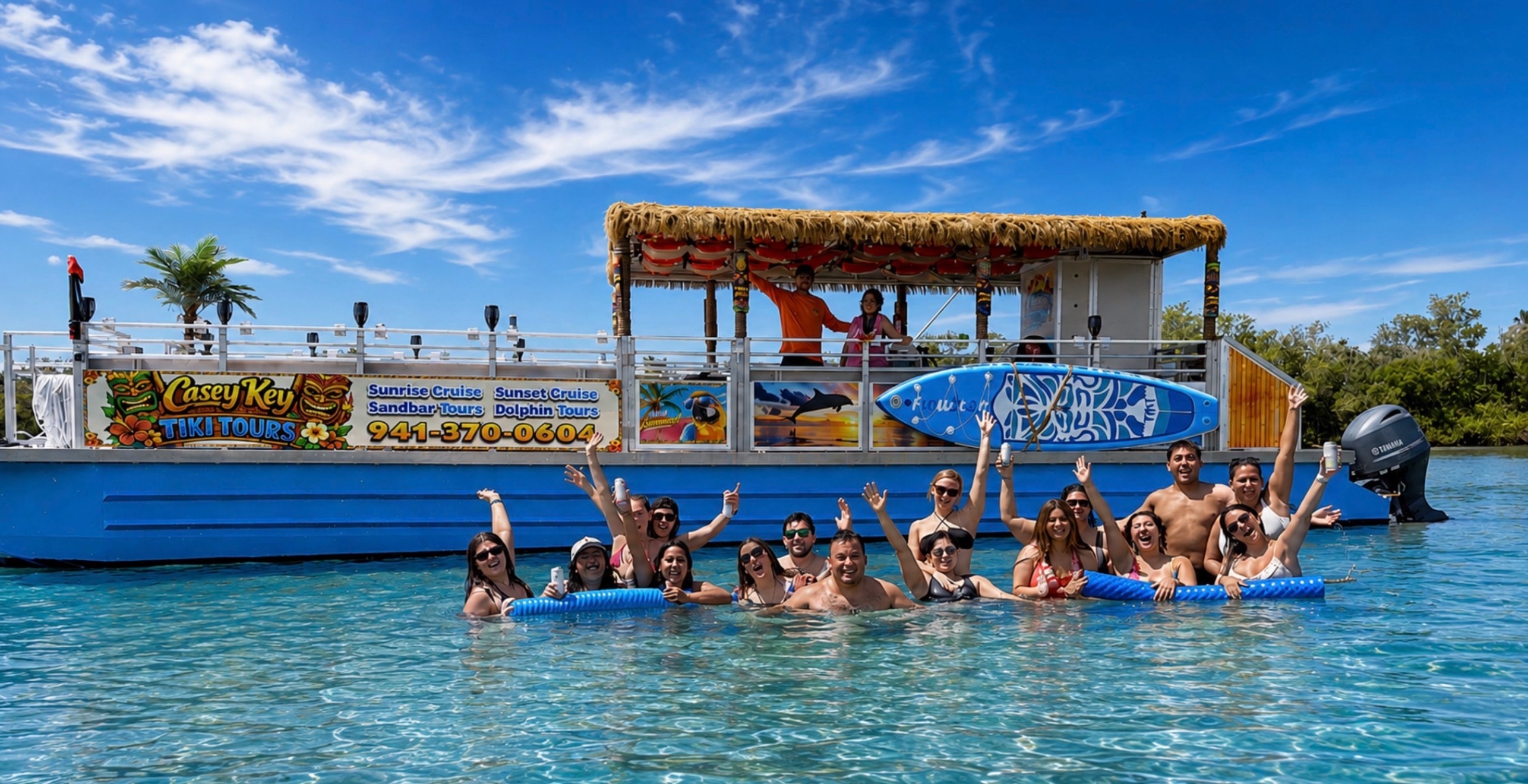 Group enjoying Casey Key Tiki Tours at the sandbar